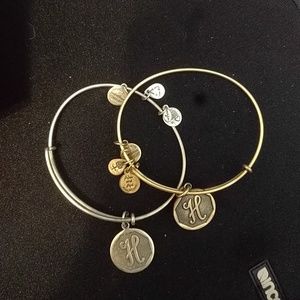 Silver colored and bronze colored H bracelets
